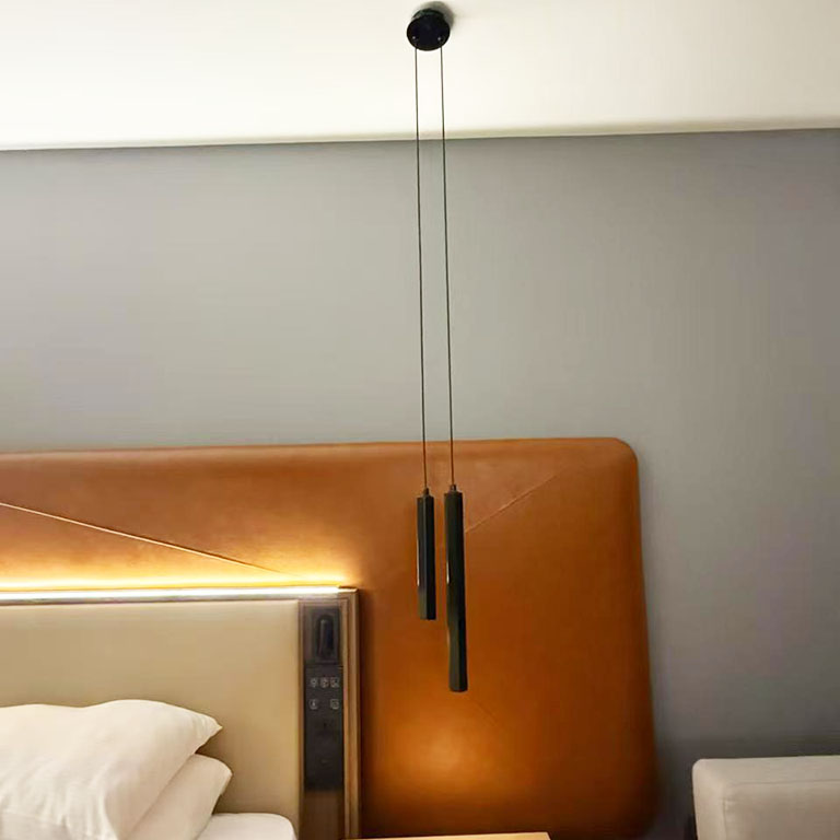 What aspects should be taken into consideration when manufacturing hotel guestroom lamps?